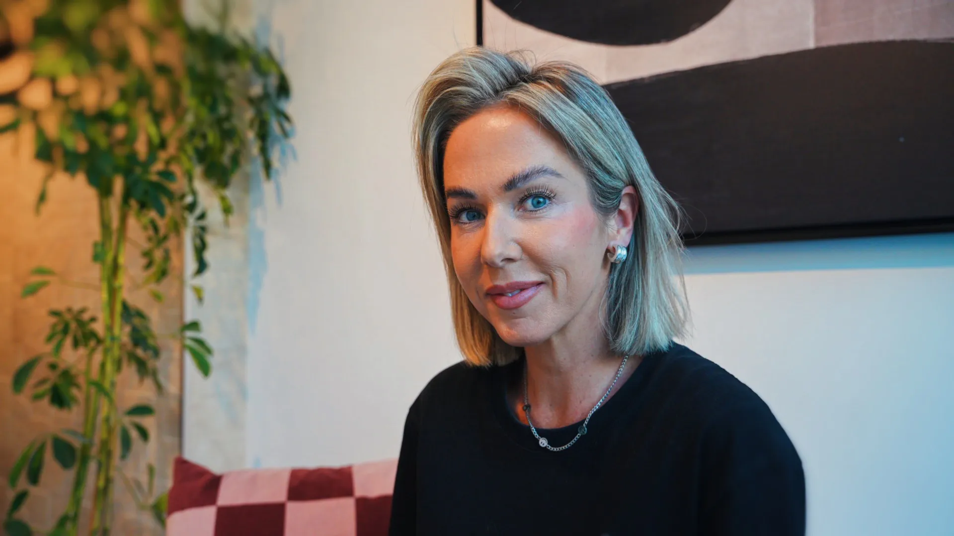 Blonde Woman Wearing Black Shirt