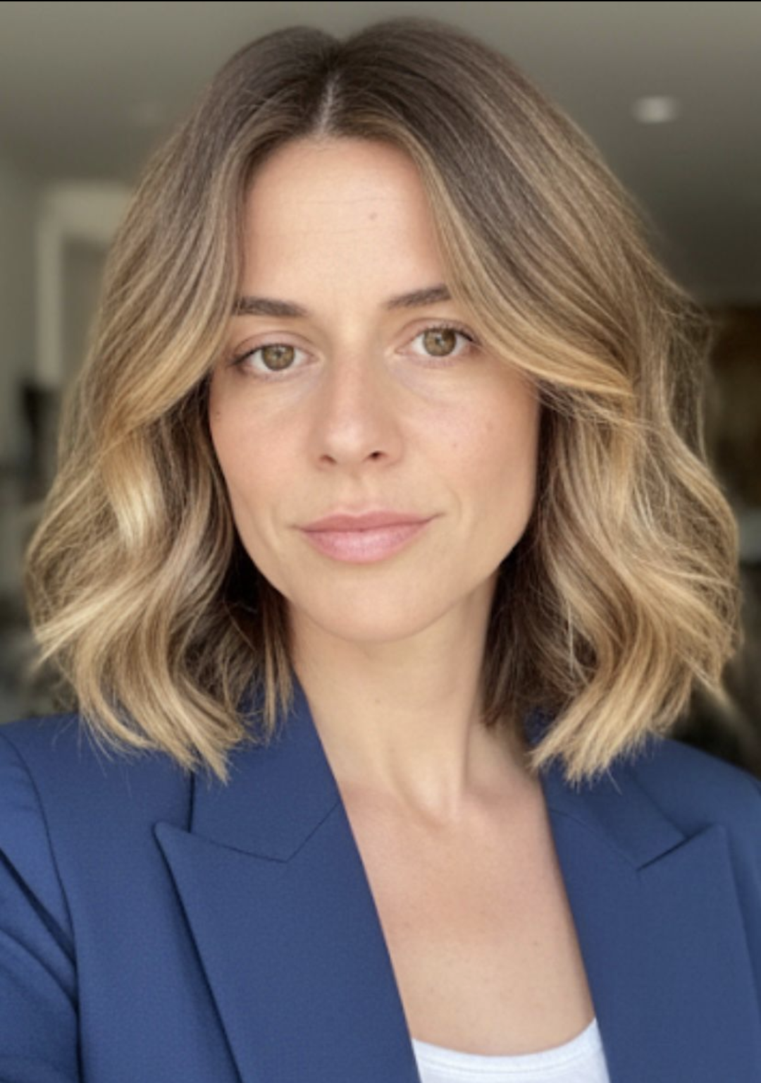 Palma Hair Concept Hairdresser with Blue Jacket.